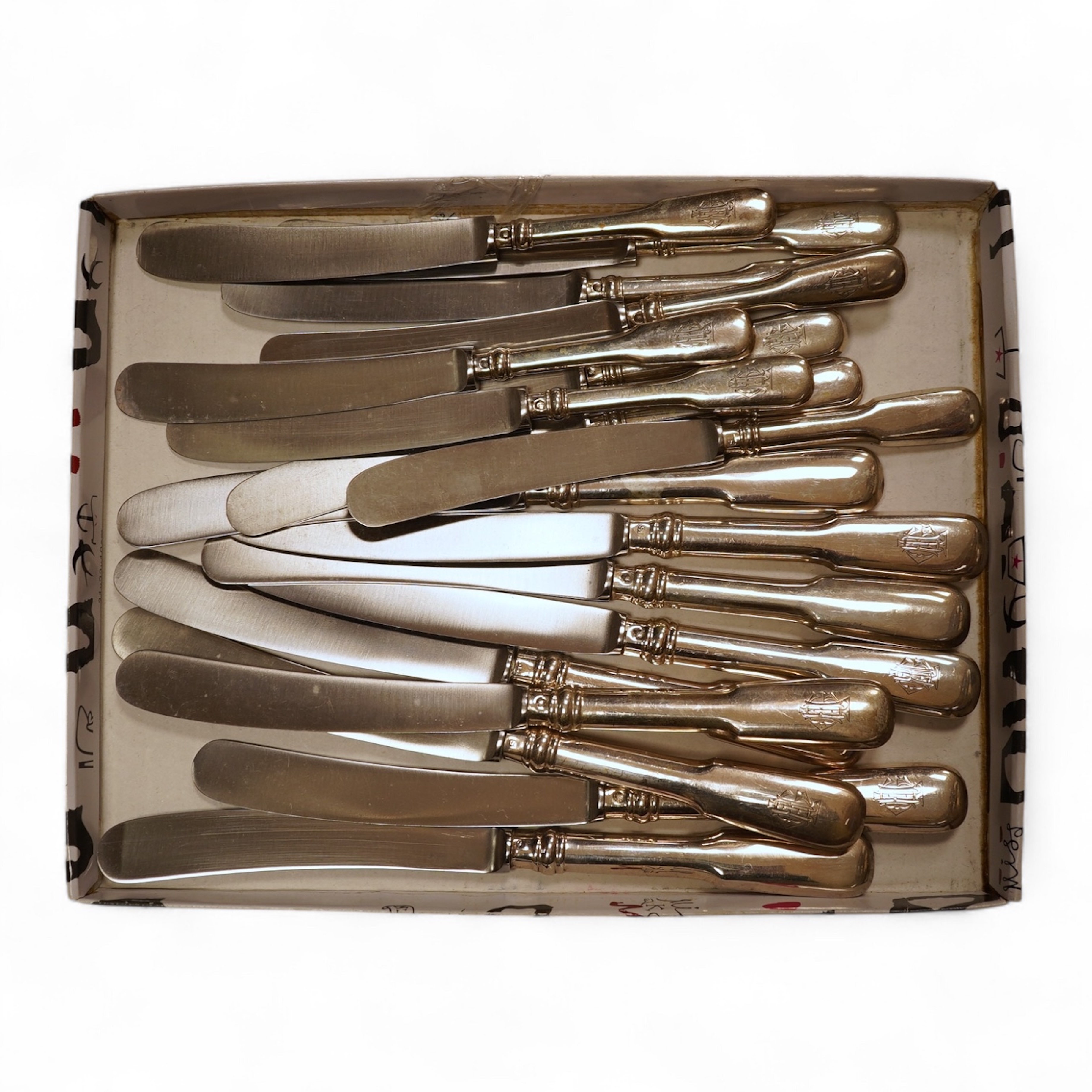 A set of nine Austro-Hungarian white metal handled table knives, 26cm. and nine matching dessert knives, all with engraved monogram and re-bladed.